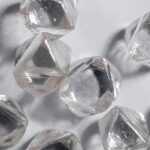 De Beers’ mother or father firm reduces worth by nearly half