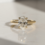 Bow-Tie Impact in Oval Diamonds: A Full Information